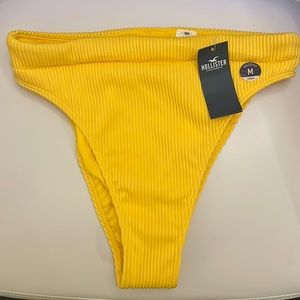 Hollister Bathing suit bottoms. Medium cheeky, yellow.